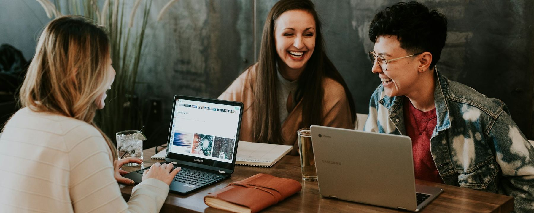 Creators and brand partners reviewing content together at a shared table